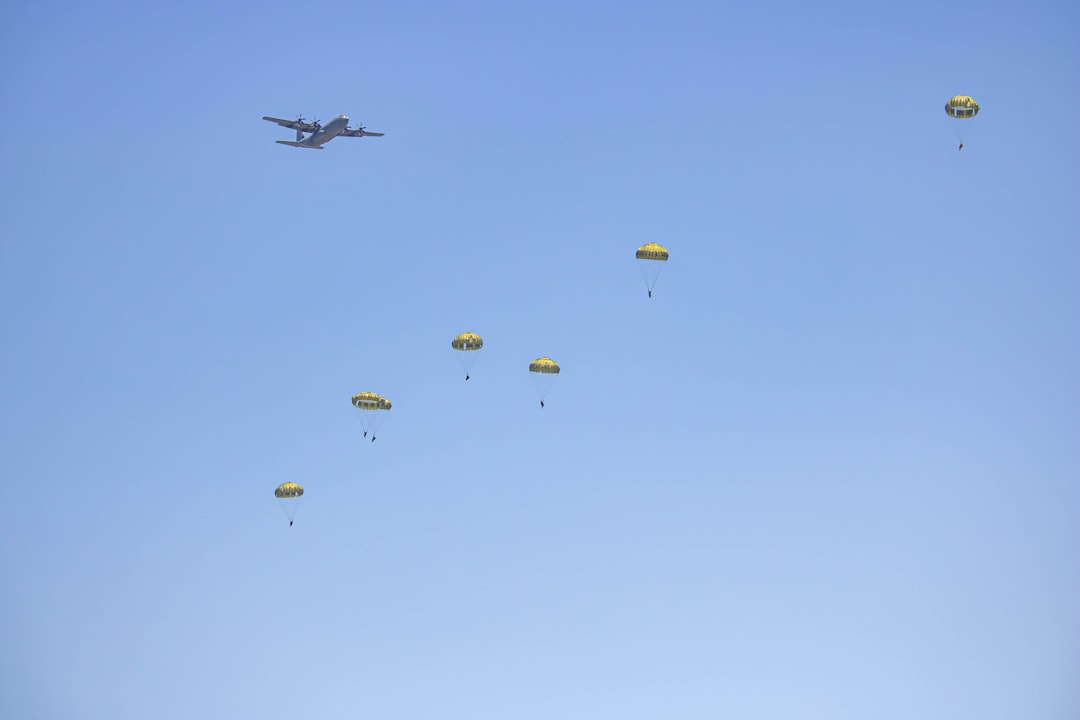 Military transport aircraft with paratroopers