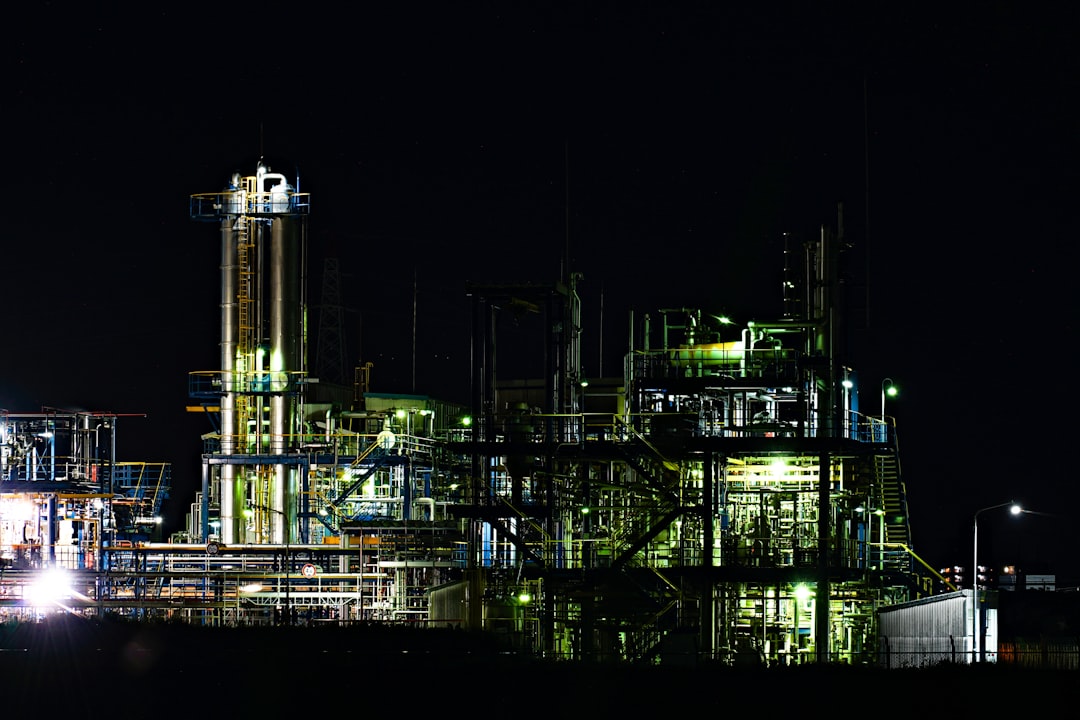 Oil refinery complex illuminated at night