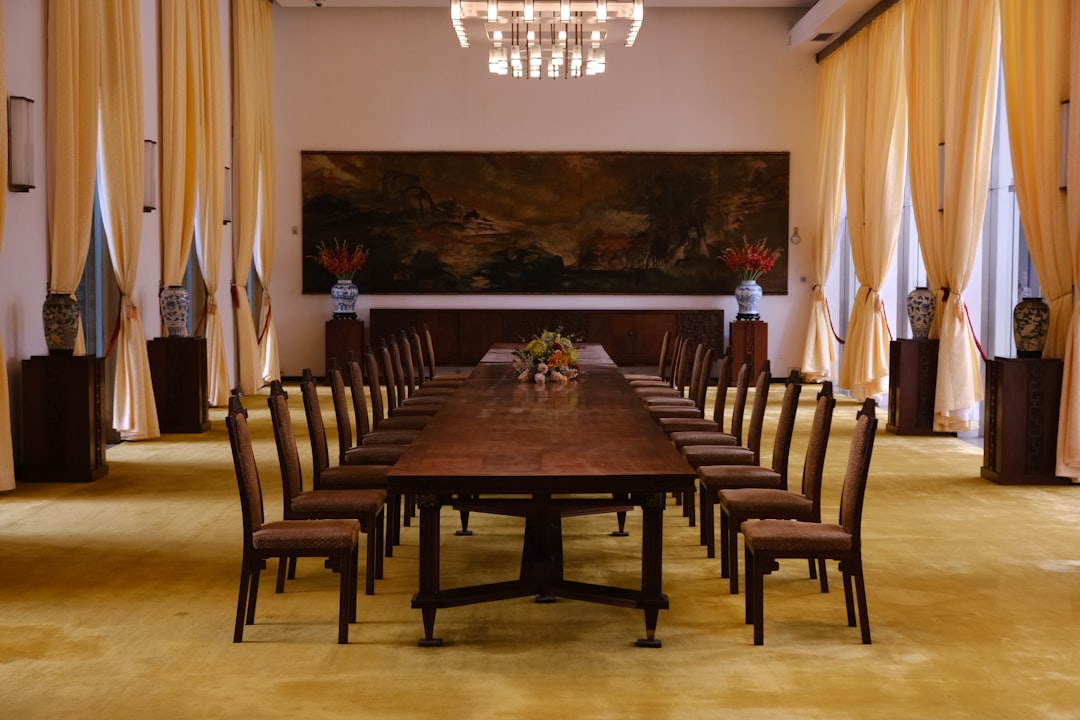 Empty diplomatic conference room after failed negotiations