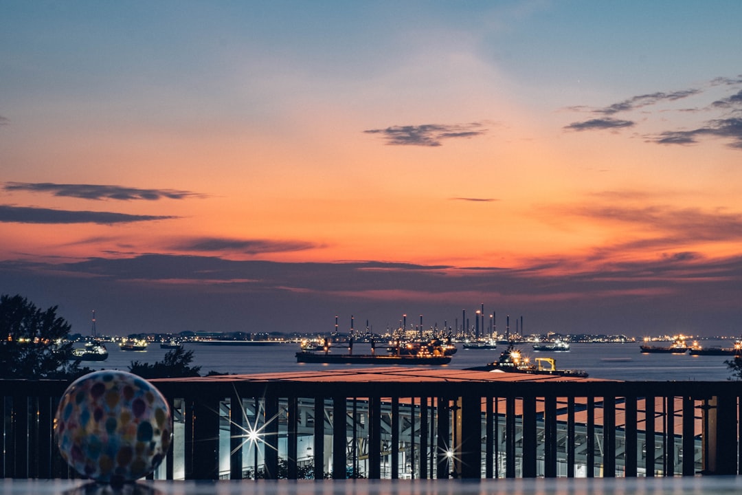 Oil refinery complex at sunset showing industrial infrastructure