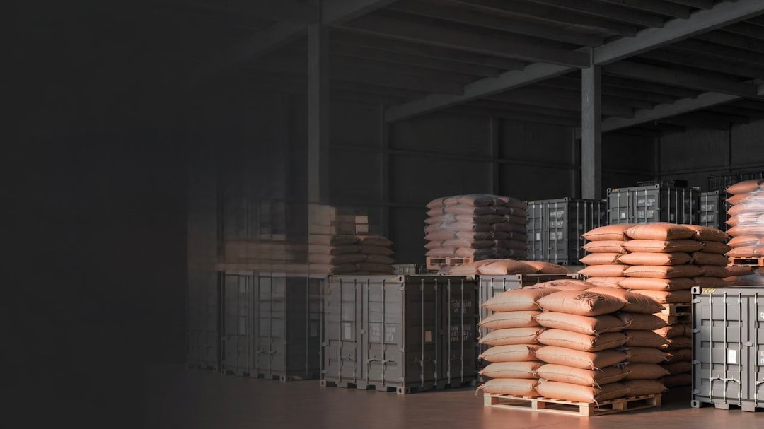 Stacked sacks of fertilizer in an industrial warehouse