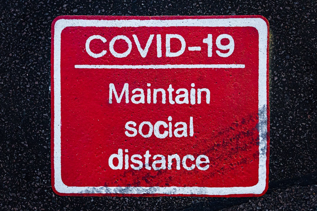 A red medical isolation warning sign.