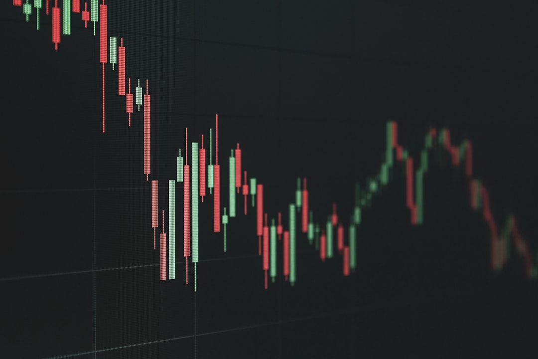 A digital trading interface showing red price movement.